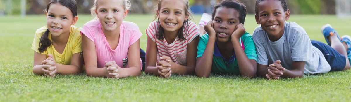 school-kids-lying-on-playground.jpg